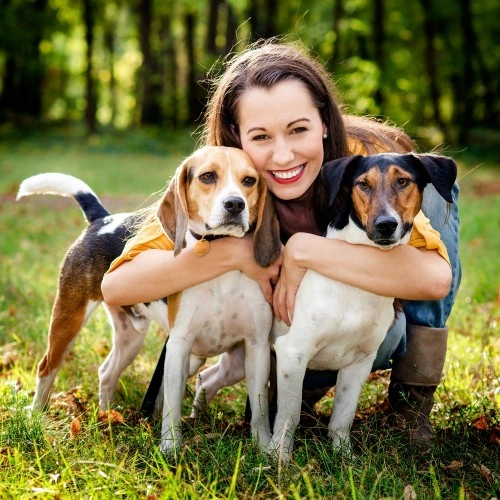 woman with two lovely dogs